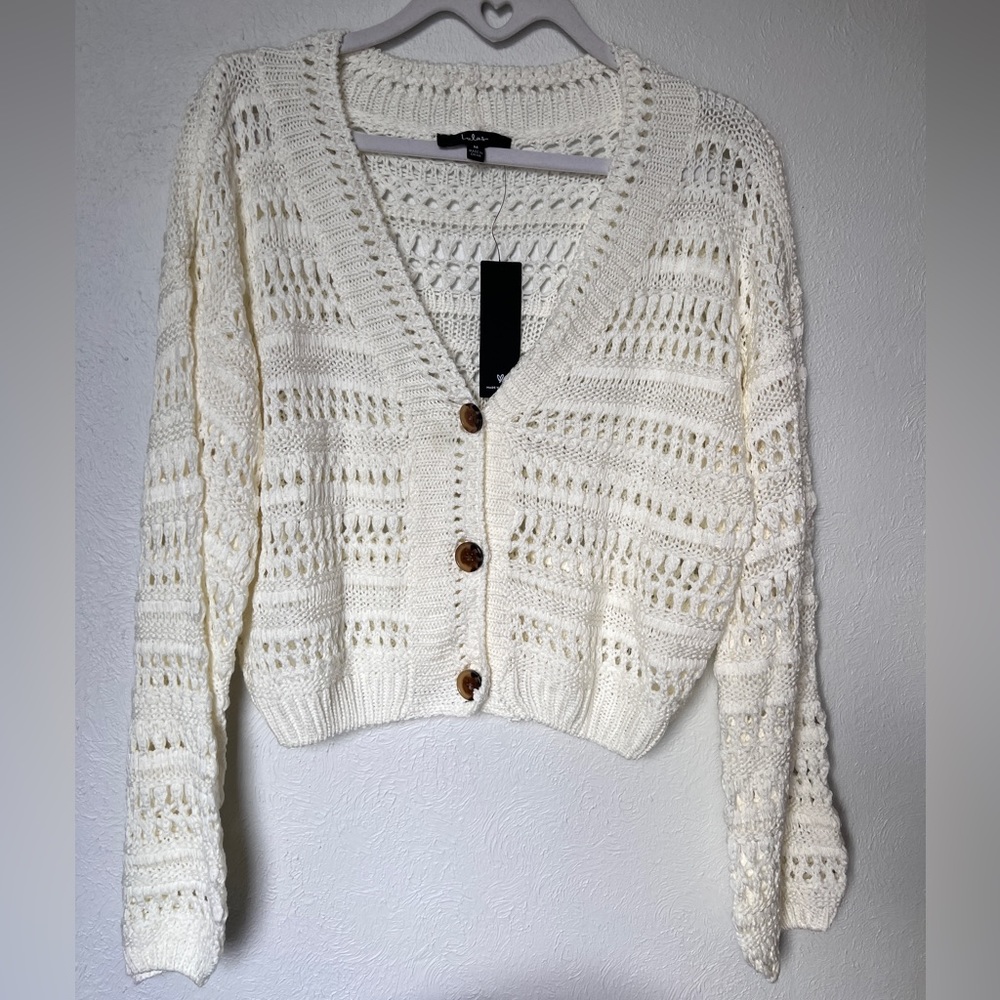 Make an offer!! About to donate. Lulus ivory knit sweater.